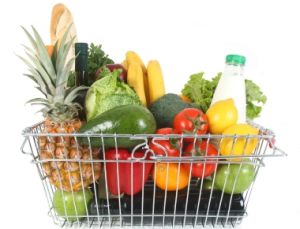 Shopping basket filled with fresh fruit and vegetables